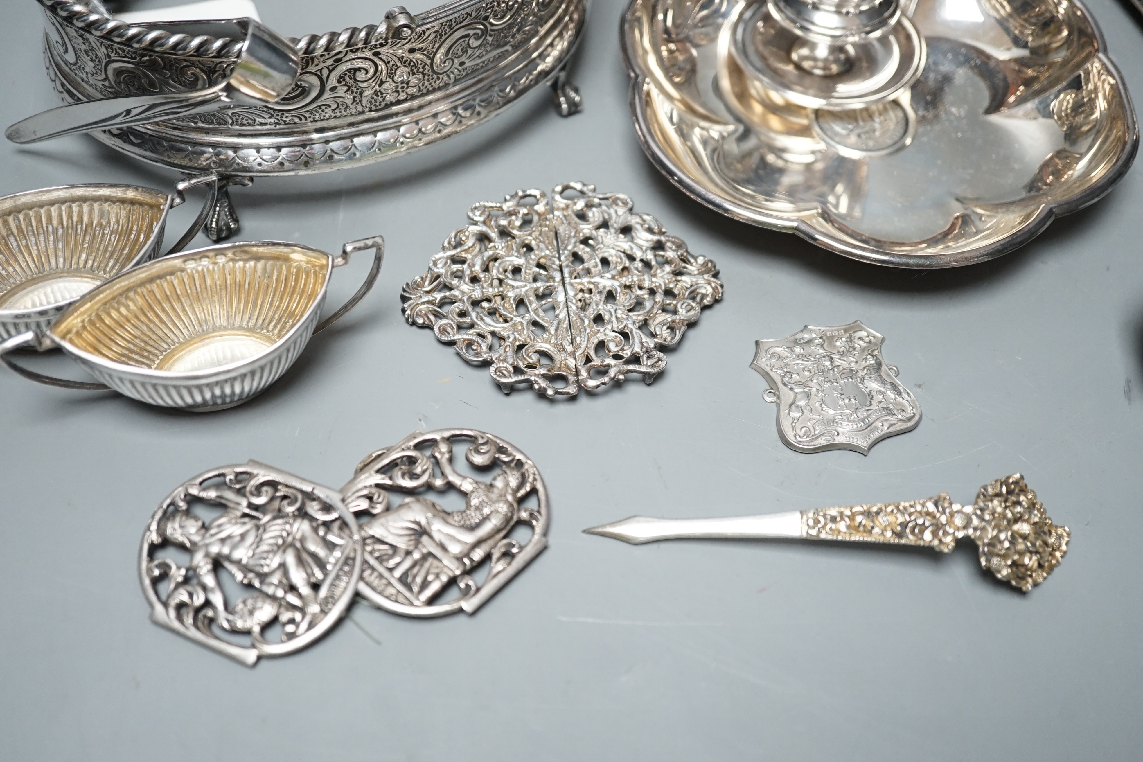Sundry small silver including Georgian stand base, John Emes, London, 1806, length 14.1cm, pair of later salts and a small plaque, together with other continental white metal items including a German beaker, nurses buckl